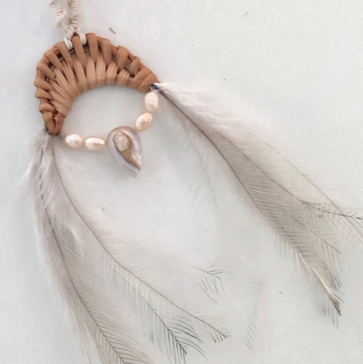Pearl & emu feather twist necklace